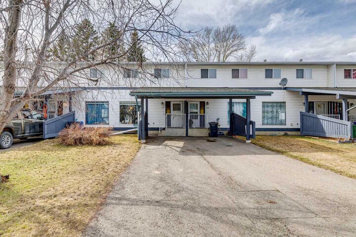Property Photo: 107 Elm Place 113 AB T1S 1J1
