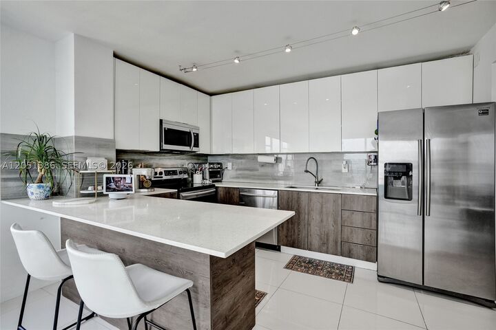 Property Photo: 11111 Biscayne Blvd 1915 FL 33181