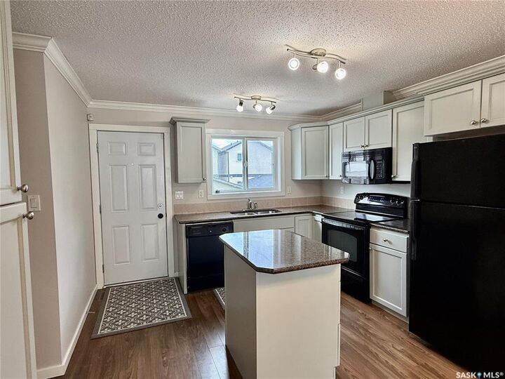 Property Photo: 315 Hampton Circle 405 SK S7R 0E9