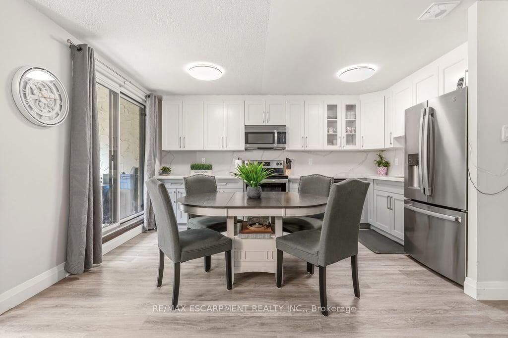 Property Photo: 1066 Falgarwood Drive 154 ON L6H 2P3