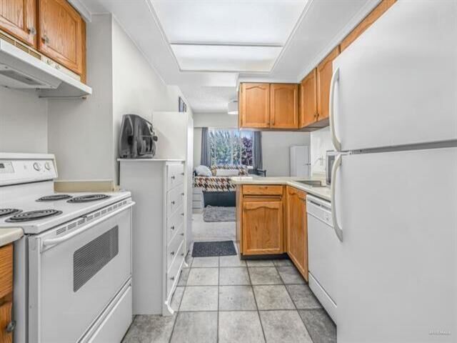 Property Photo:  13530 Hilton Road 304  BC V3R 5J4 