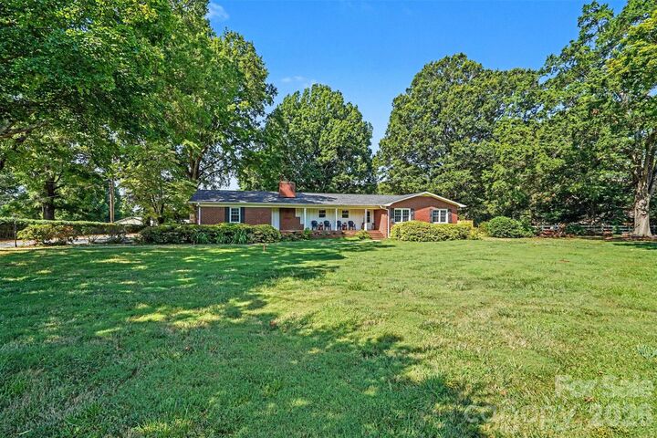 Property Photo:  12620 Idlewild Road  NC 28105 