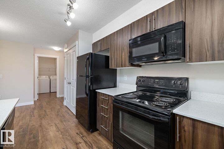 Property Photo:  4615 199 Street NW  AB T6M 1M5 