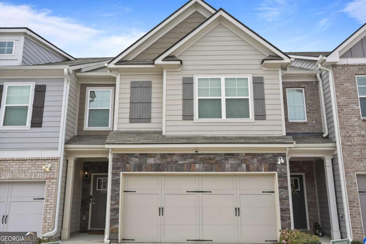 Property Photo:  7637 Avalon Boulevard  GA 30213 