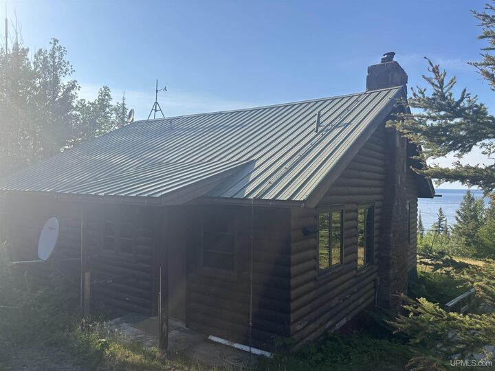Property Photo:  13290 M-26 Highway  MI 49950 