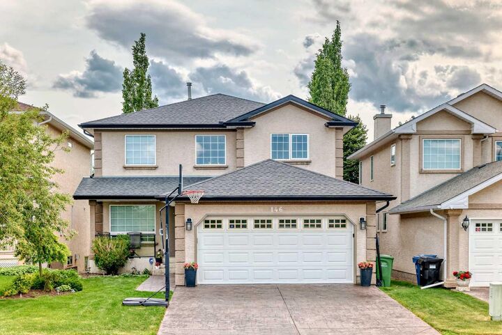 Property Photo: 146 Scenic View Close AB T3L 1Z4