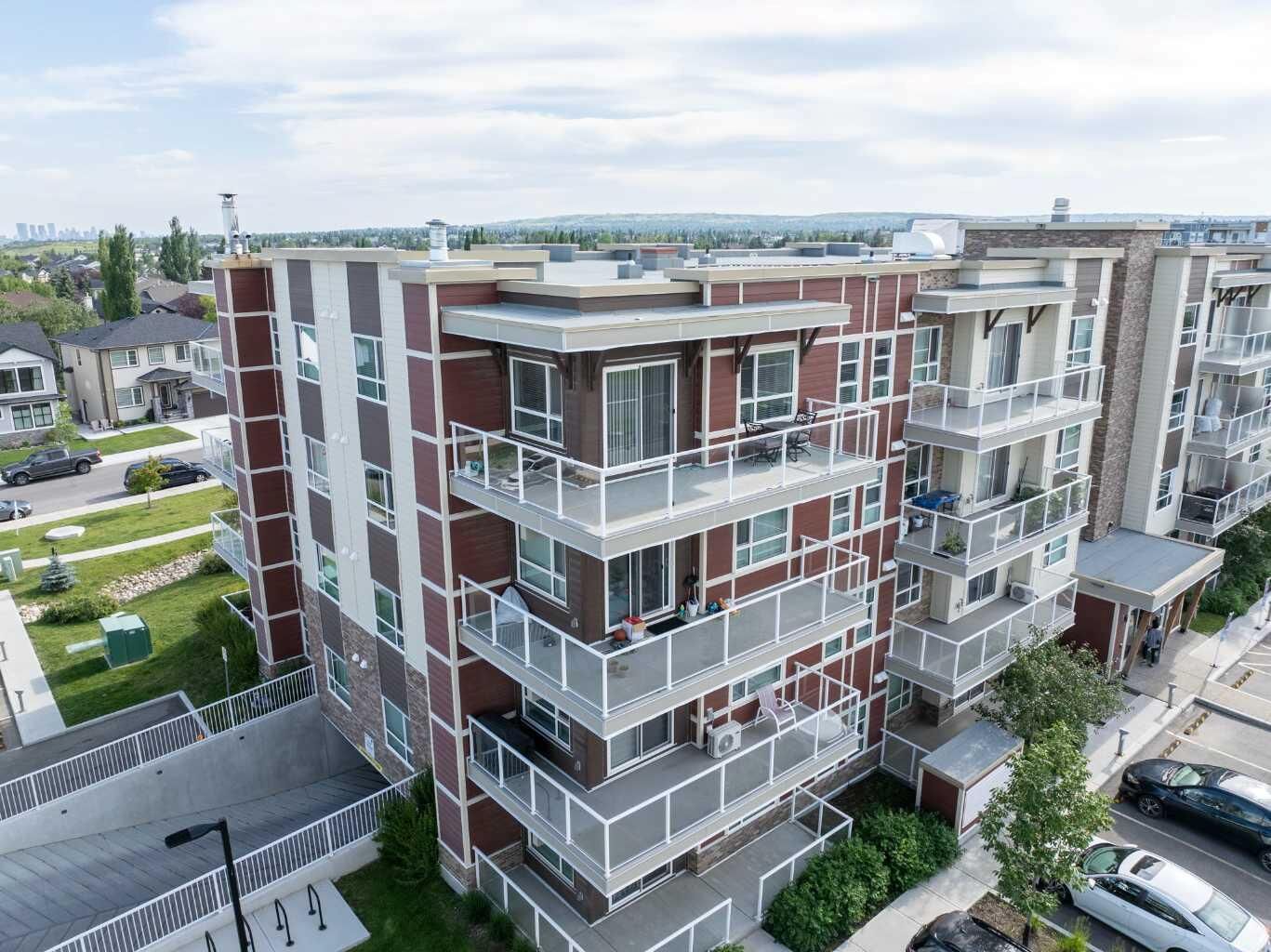 Property Photo:  300 Harvest Hills Place NE 402  AB T3K 2P4 