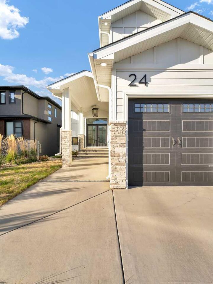 Property Photo:  24 Coulee Ridge Drive SW  AB T1B 0T3 