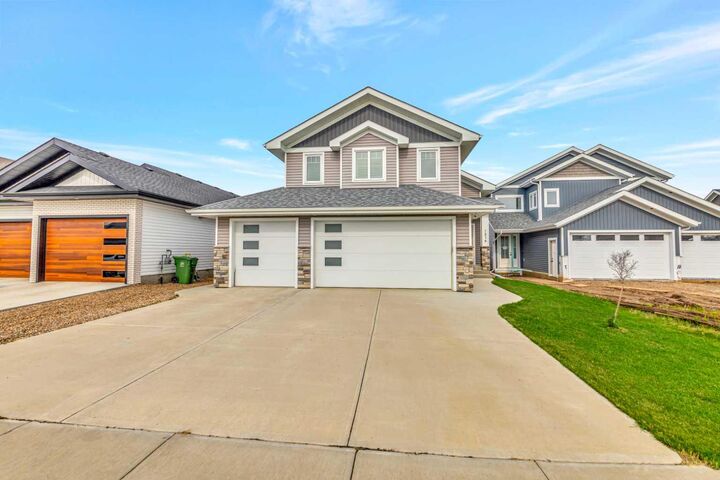 Property Photo: 1316 47 Avenue Close SK S9V 2K3