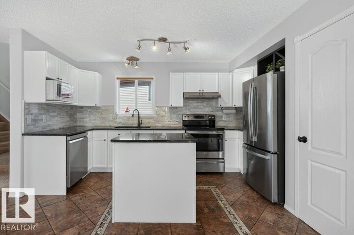 Property Photo:  438 Gibb Wynd NW  AB T5T 6W7 