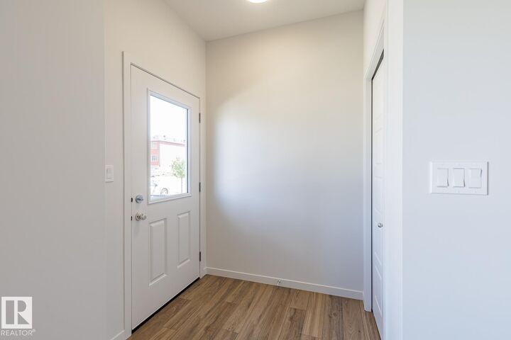Property Photo: 3619 Triomphe Boulevard AB T4X 3A7