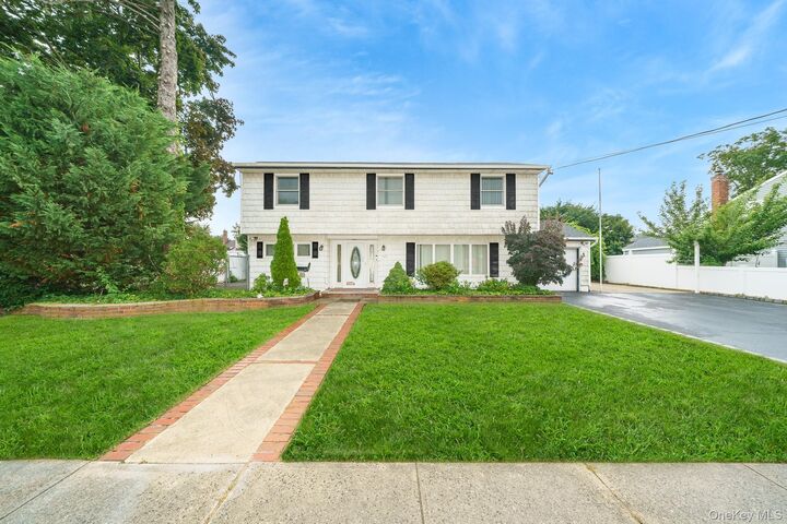Property Photo:  195 N Albany Avenue  NY 11758 
