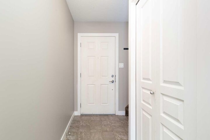 Property Photo: 205 Silkstone Road W 6 AB T1J 4J9