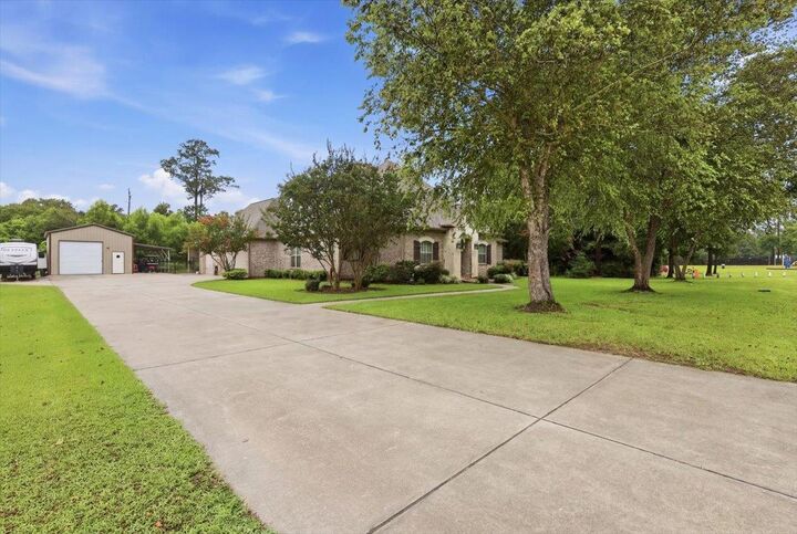 Property Photo: 12050 Woodland Drive TX 77705
