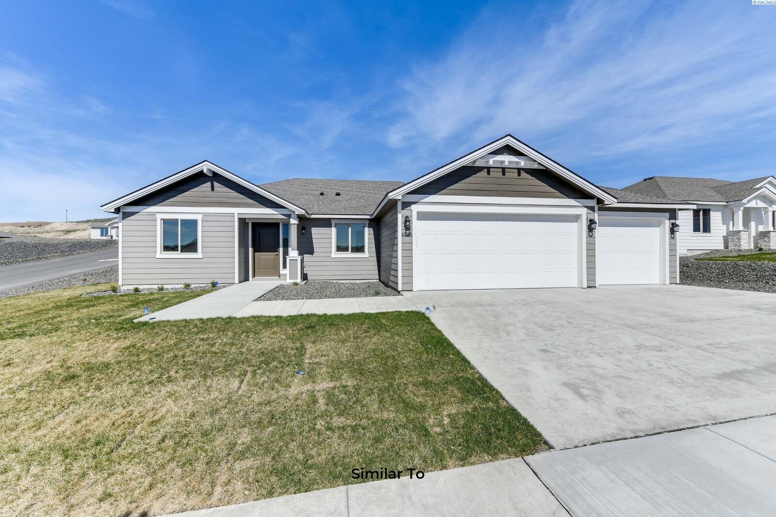 Property Photo: 10127 Redbud Dr WA 99301