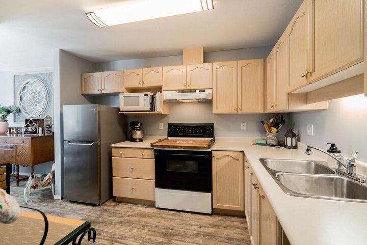 Property Photo: 19130 Ford Road 203 BC V3Y 2P1