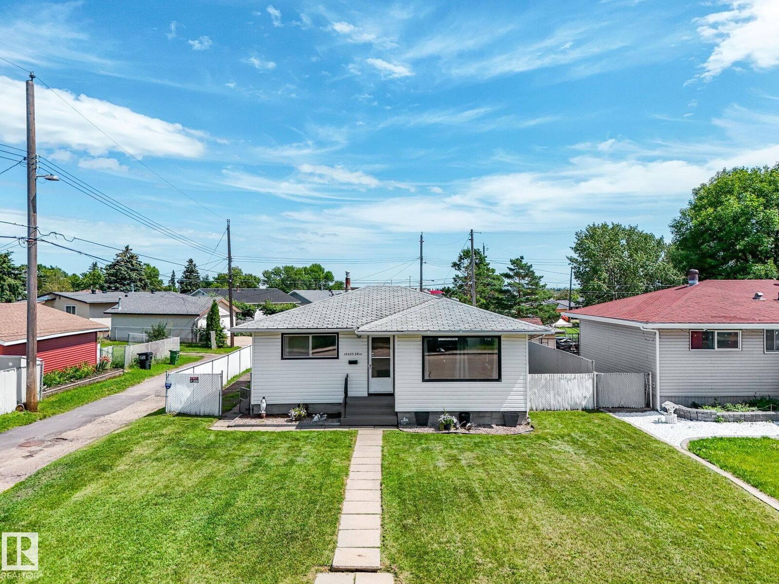 Property Photo: 13323 58 Street NW AB T5A 0P9