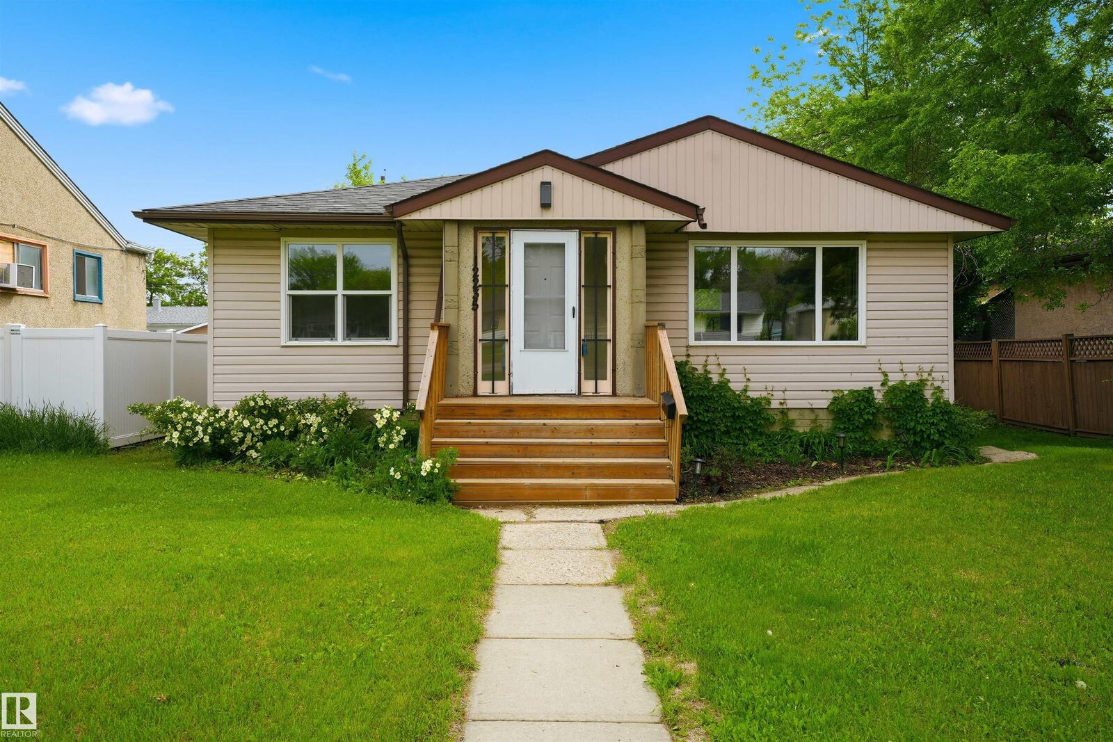 Property Photo:  12235 St Albert Trail NW  AB T5L 4G7 