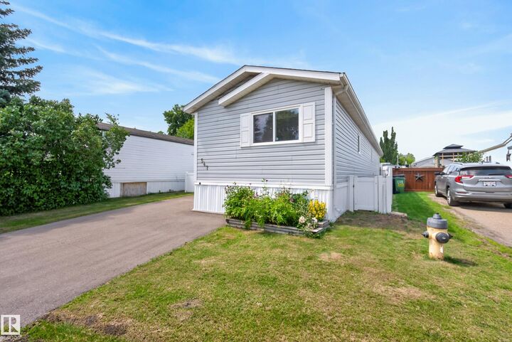 Property Photo: 547 Evergreen Park NW AB T5Y 4M2