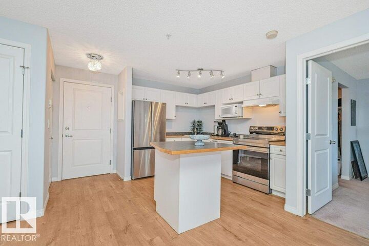 Property Photo:  245 Edwards Drive SW 217  AB T6X 1J9 