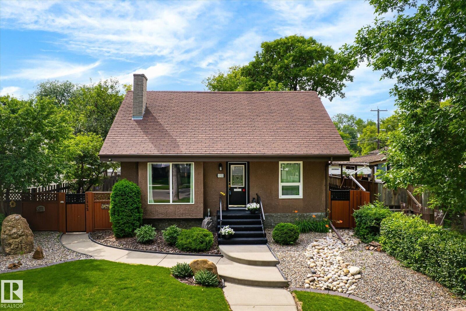 Property Photo: 11322 56 Street NW AB T5W 3S4