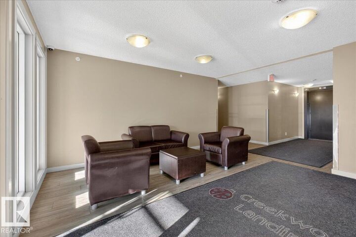 Property Photo: 5390 Chappelle Road SW 213 AB T6W 3K7