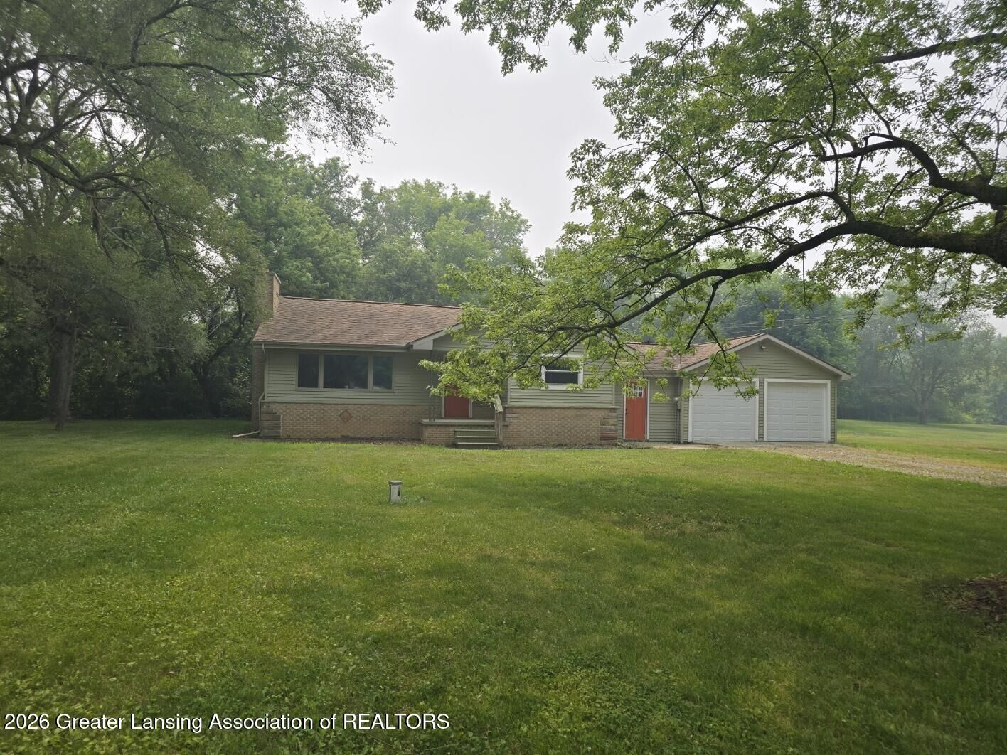 Property Photo:  3725 Lansing Road  MI 48872 
