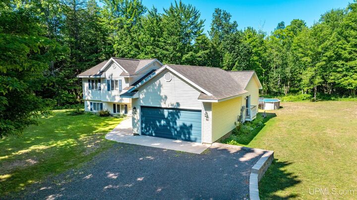 Property Photo:  21966 Creamery Road  MI 49916 