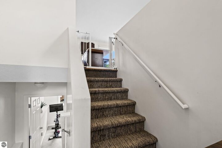 Property Photo:  4769 Sandtrap Drive  MI 49685 
