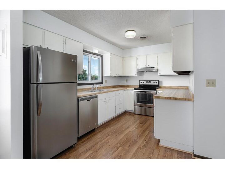 Property Photo:  1811 Greenfield Lane SW 12  MN 55902 