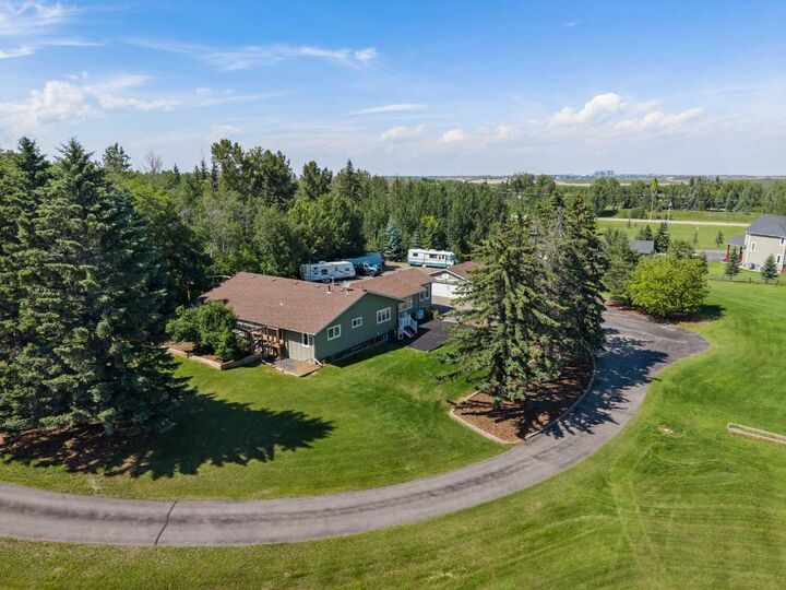 Property Photo: 242034 36 Street E AB T1S 3P9