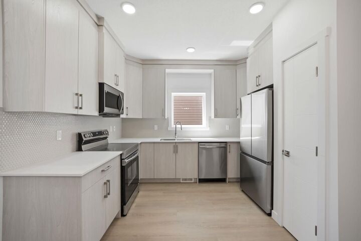 Property Photo: 348 Cornerbrook Drive NE AB T3N 2J3