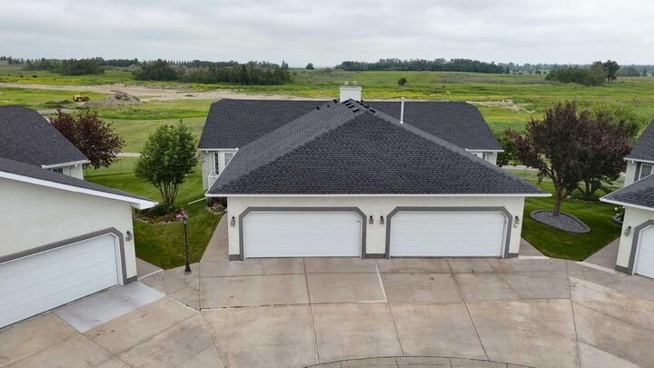Property Photo: 33 Strathmore Lakes Bay AB T1P 1L8