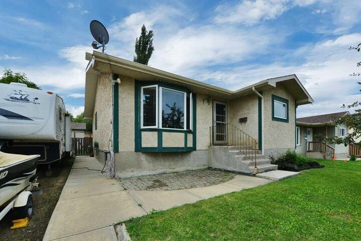 Property Photo: 11 Greenham Drive AB T4P 2K5