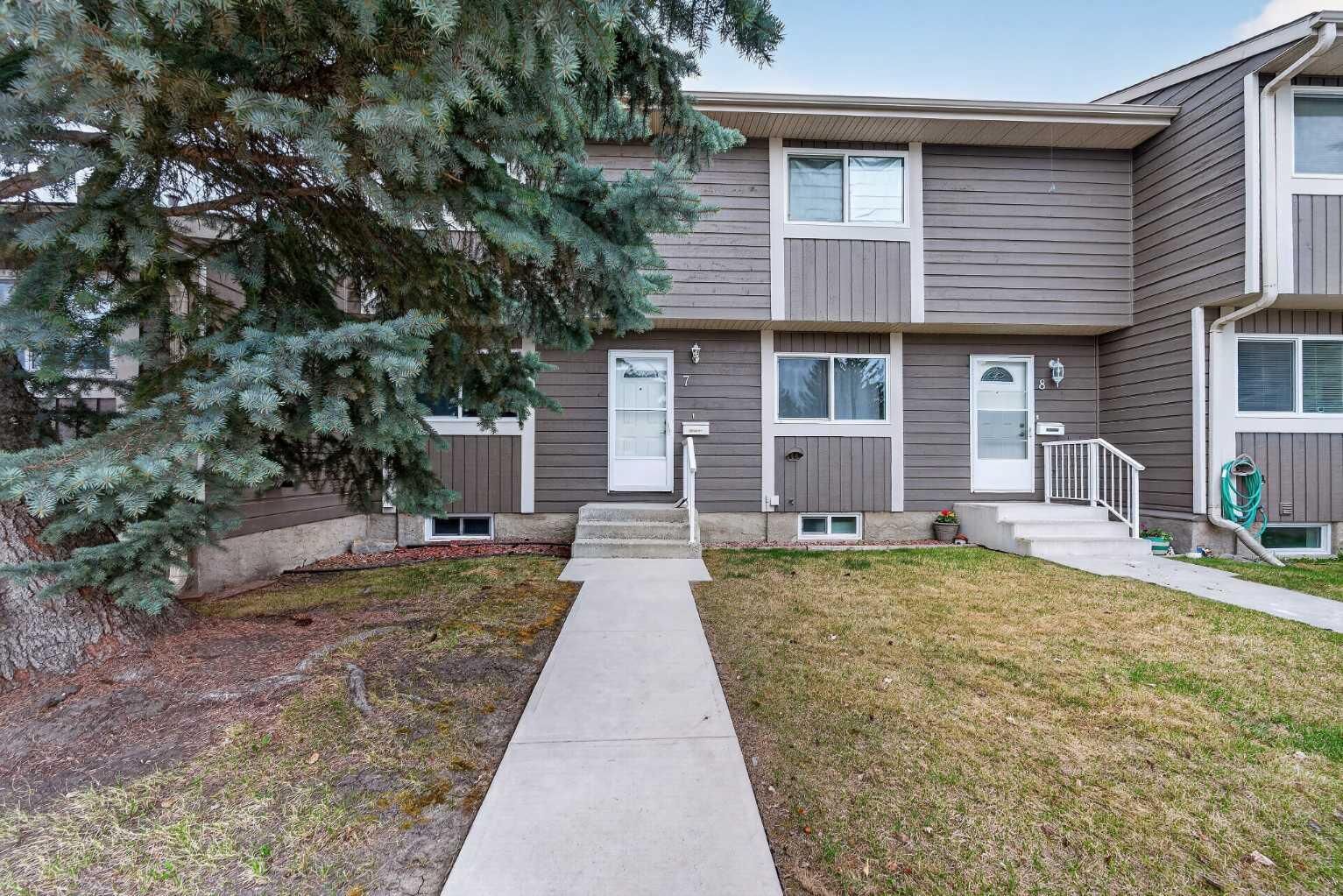 Property Photo:  14736 Deerfield Drive SE 7  AB T2J 5Y1 