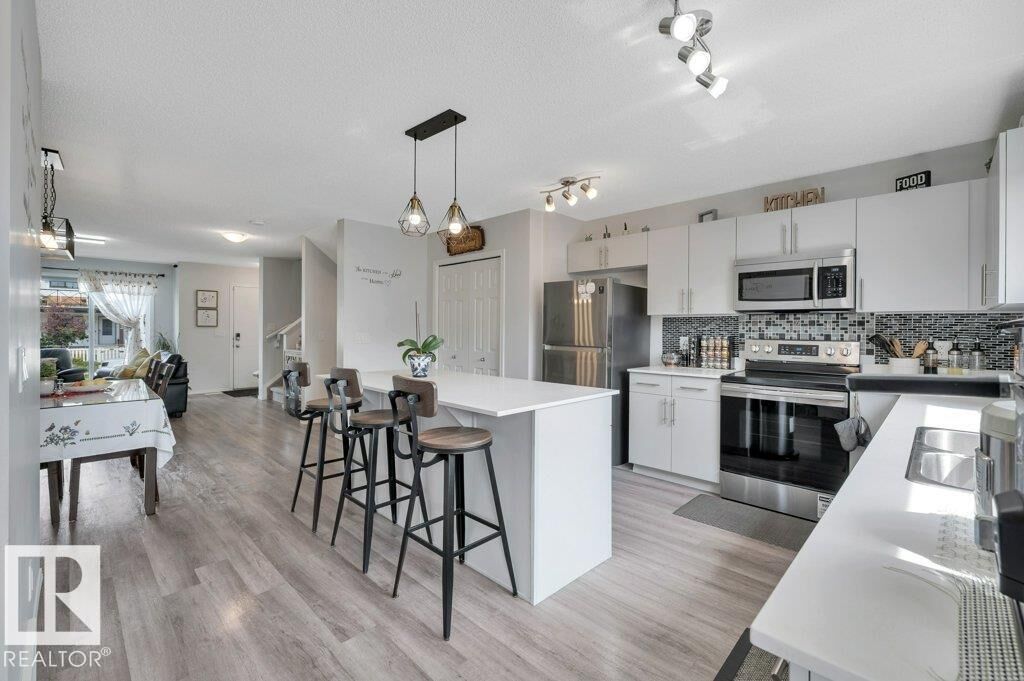 Property Photo: 19303 27 Avenue NW AB T6M 1K9