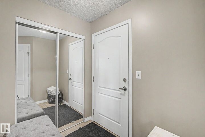 Property Photo: 7511 171 Street NW 311 AB T5T 6S7
