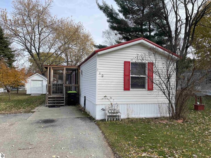 Property Photo:  310 Kristy Jo Street  MI 49601 