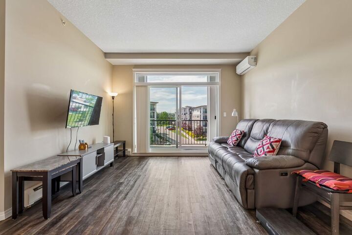 450 Sage Valley Drive NW 1403 — photo 1