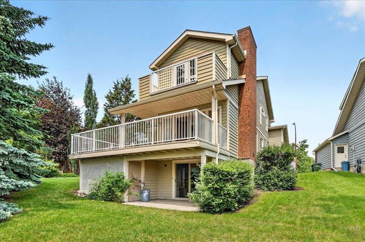 Property Photo: 212 Stravanan Bay SW AB T3H 1H4