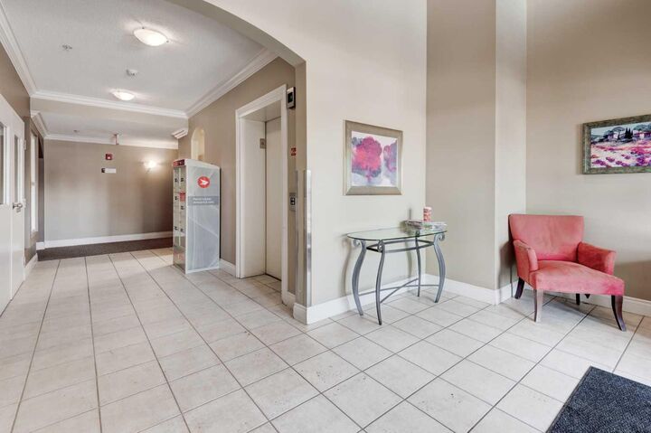 Property Photo: 11170 30 Street SW 207 AB T2W 6J2