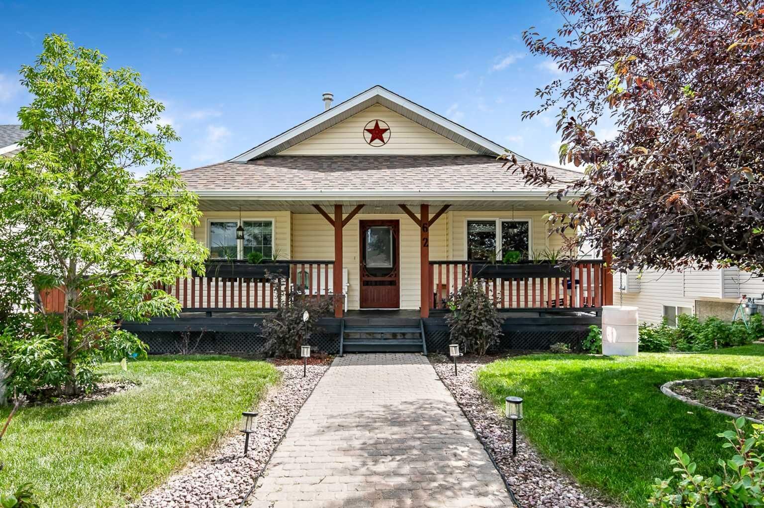 Property Photo:  62 Westland Street  AB T1S 2C2 