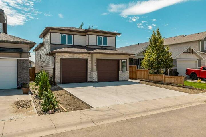 Property Photo:  103 Riverford Close W  AB T1K 8E6 