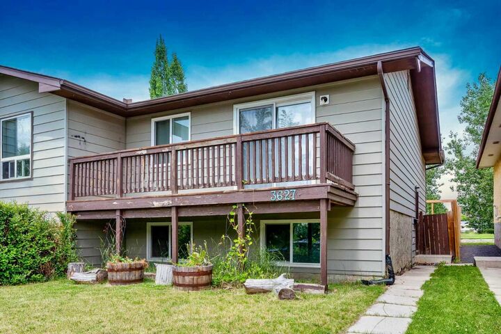 Property Photo: 3627 Cedarille Drive SW AB T2W 3J5