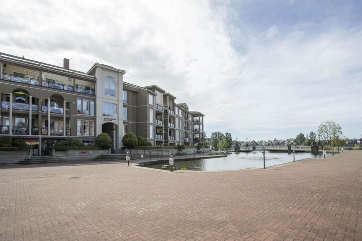 Property Photo: 2 Renaissance Square 309 BC V3M 6K3