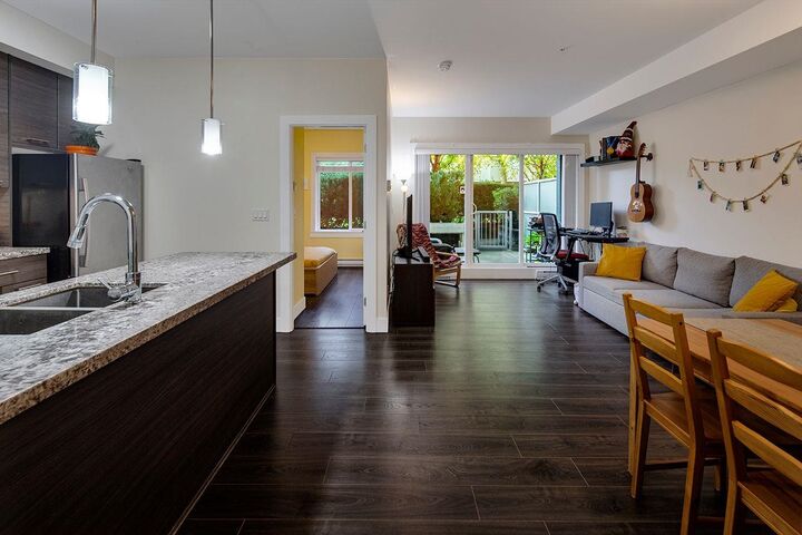 Property Photo:  7377 14th Avenue 106  BC V3N 1Z7 
