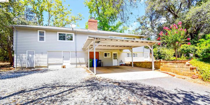 Property Photo: 831 E Oakside Dr CA 95370
