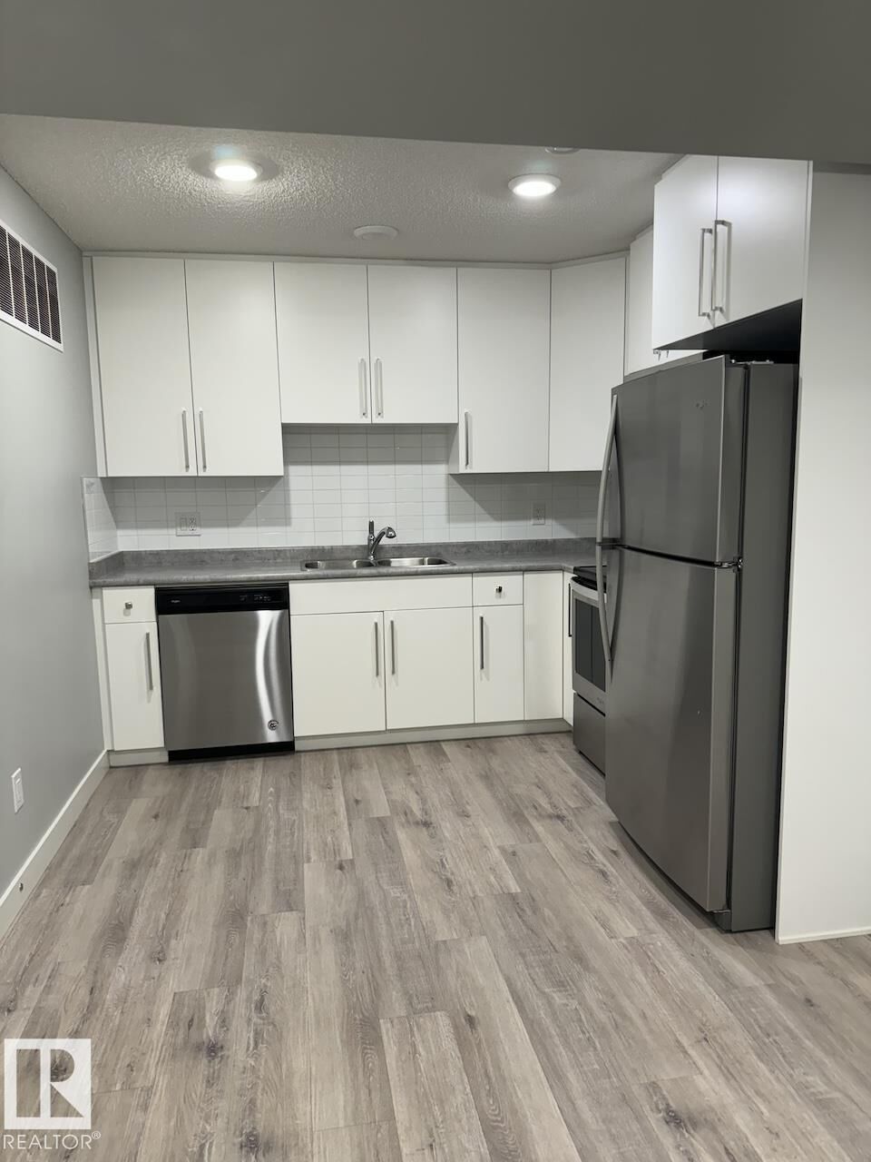 Property Photo: 6417 177 Avenue NW Bsmt AB T5Y 3X4