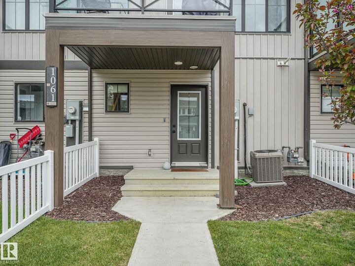 Property Photo:  1061 Cy Becker Road NW  AB T5Y 4B7 