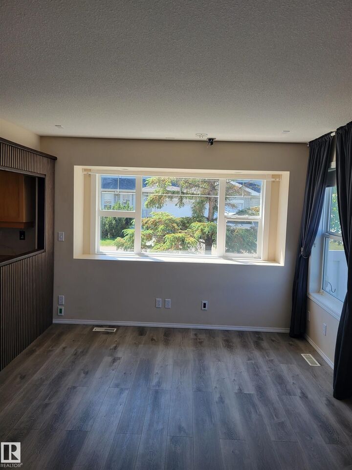 Property Photo: 230 Edwards Drive SW 157 AB T6X 1G7